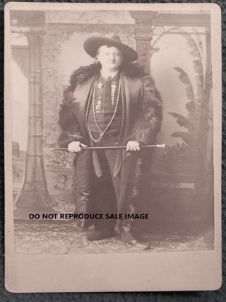 UKNOWN CABINET CARD OF WELL-DRESSED MAN IN WESTERN GARB WITH BEAR OR BUFFALO COAT. Western Gent.